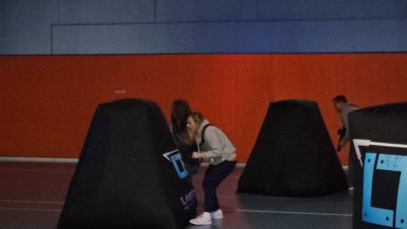 Laser Tag with blow up obstacles in the blue gym at Snow College