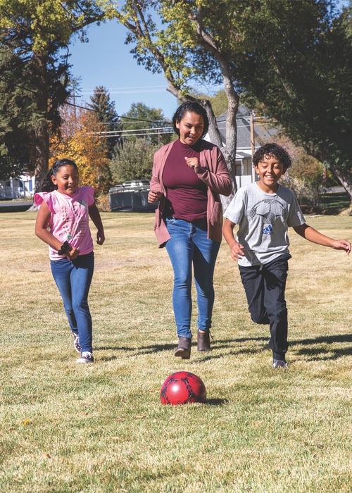 Family playing Soccer